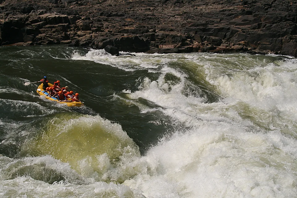 White-water rafting through the powerful rapids of the Zambezi River below Victoria Falls