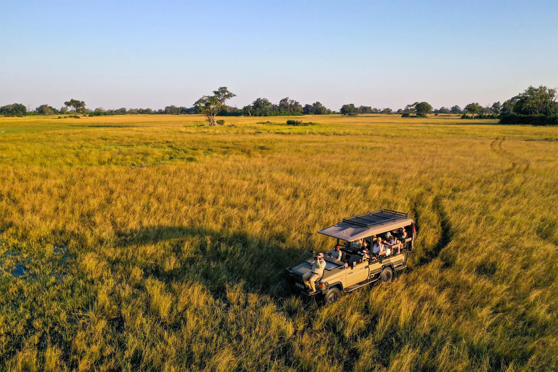 safari vehicle in okavango origins