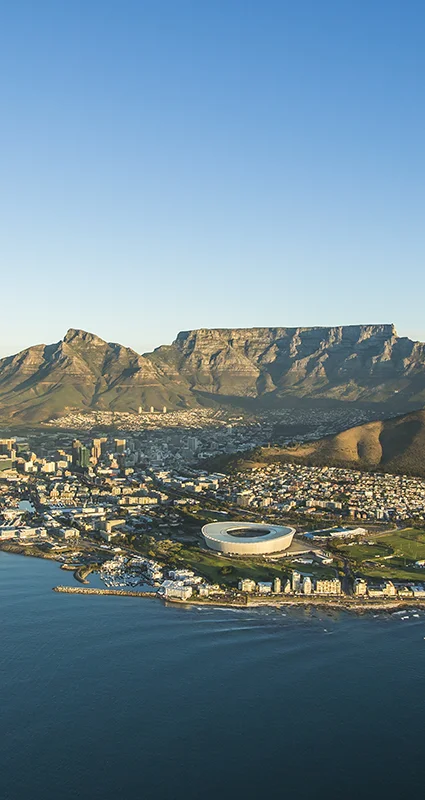 Aerial view of Cape Town with Table Mountain, Lion’s Head, Cape Town Stadium and the Atlantic Ocean